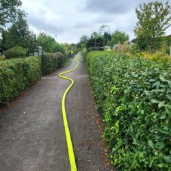 Feuerwehrschlauch durch Gartenkolonie Bornumer Holz